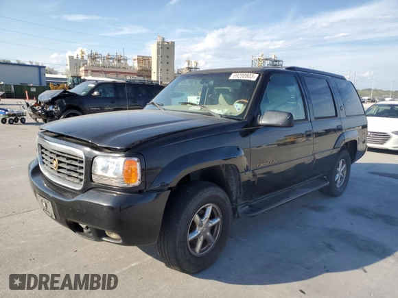 2000 Cadillac Escalade z VIN 1GYEK13R0YR167895, wystawiony jako Copart lot #82586443 z przebiegiem 267 099 mil mil oraz Szkoda całkowita • Salvage title. Historia ofert i sprzedaży dostępna na DreamBid. Obrazek 1.