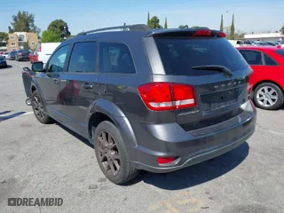 2014 Dodge Journey SXT with VIN 3C4PDCBB7ET164214, listed as a IAAI auction lot 41852243 with 213,439 mi miles. Bid and sale history available at carsss.com. Image 3.