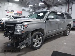 2018 Chevrolet Suburban Premier z VIN 1GNSKJKC9JR100134, wystawiony jako IAAI lot #41449255 z przebiegiem 111 528 mil mil oraz . Historia ofert i sprzedaży dostępna na DreamBid. Obrazek 2.
