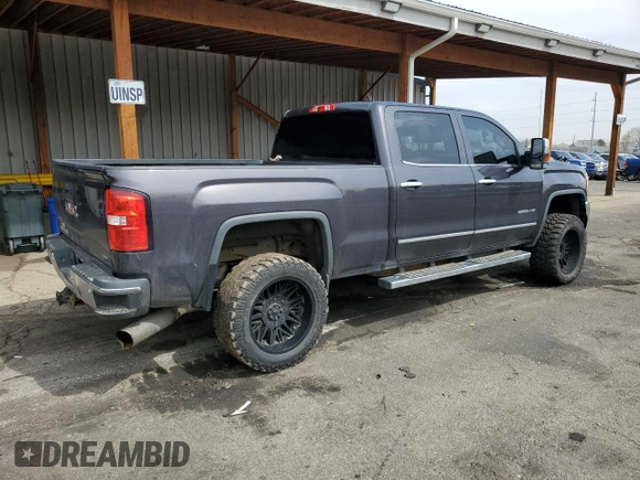 2015 GMC Sierra 2500HD SLT with VIN 1GT12ZE85FF589148, listed as a Copart auction lot 51329515 with 194,378 mi miles and Salvage title. Bid and sale history available at DreamBid. Image 3.