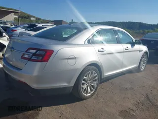 2014 Ford Taurus Limited with VIN 1FAHP2F8XEG133523, listed as a IAAI auction lot 40285220 with 134,939 mi miles. Bid and sale history available at carsss.com. Image 4.