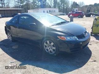 2009 Honda Civic Cpe LX with VIN 2HGFG12669H509744, listed as a IAAI auction lot 41777731 with 202,530 mi miles. Bid and sale history available at carsss.com. Image 1.