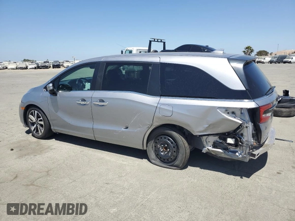 2023 Honda Odyssey Touring with VIN 5FNRL6H86PB043474, listed as a Copart auction lot 61672545 with 39,176 mi miles and Salvage title. Bid and sale history available at DreamBid. Image 2.