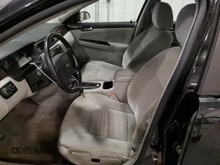 2014 Chevrolet Impala LT with VIN 2G1WB5E31E1149476, listed as a Copart auction lot 60458855 with 99,509 mi miles and Salvage title. Bid and sale history available at DreamBid. Image 7.