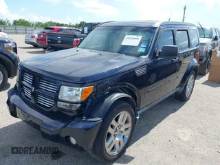 2011 Dodge Nitro Heat with VIN 1D4PT4GK1BW563775, listed as a IAAI auction lot 42573092 with 125,280 mi miles and . Bid and sale history available at DreamBid. Image 2.