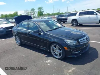 2011 Mercedes-Benz C with VIN WDDGF5EBXBA520097, listed as a IAAI auction lot 42099592 with 115,849 mi miles. Bid and sale history available at carsss.com. Image 1.