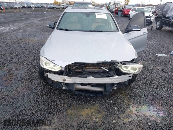 2013 BMW 3 Series 335i with VIN WBA3A9C50DF475024, listed as a IAAI auction lot 40884045 with 120,121 mi miles. Bid and sale history available at carsss.com. Image 6.