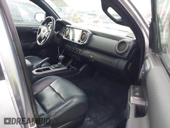 2023 Toyota Tacoma SR z VIN 3TMCZ5AN0PM538974, wystawiony jako IAAI lot #42510020 z przebiegiem 31 281 mil mil oraz . Historia ofert i sprzedaży dostępna na DreamBid. Obrazek 5.