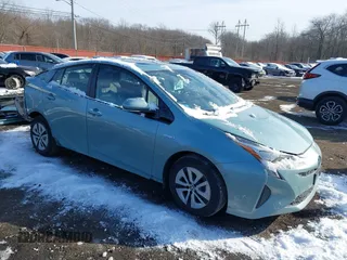 2018 Toyota Prius Two with VIN JTDKARFU5J3066998, listed as a IAAI auction lot 41405382 with 92,377 mi miles. Bid and sale history available at carsss.com. Image 1.