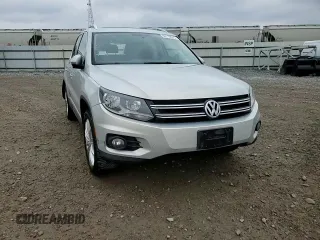 2013 Volkswagen Tiguan SE z VIN WVGBV3AX1DW579506, wystawiony jako Copart lot #52719575 z przebiegiem 163 471 mil mil oraz Szkoda całkowita • Salvage title. Historia ofert i sprzedaży dostępna na DreamBid. Obrazek 12.