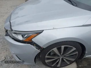 2020 Nissan Altima SR z VIN 1N4BL4CV5LN301259, wystawiony jako IAAI lot #42150709 z przebiegiem 52 512 mil mil oraz . Historia ofert i sprzedaży dostępna na DreamBid. Obrazek 6.