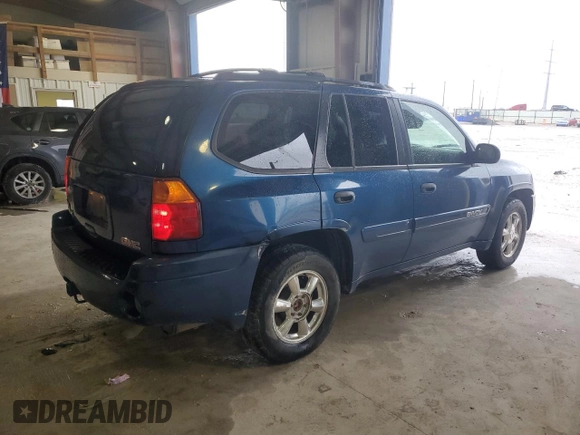 2005 GMC Envoy SLT with VIN 1GKDS13S352104934, listed as a Copart auction lot 86205864 with 166,638 mi miles and Clean Title. Bid and sale history available at carsss.com. Image 3.