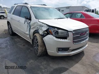 2014 GMC Acadia Denali z VIN 1GKKRTKD1EJ141312, wystawiony jako IAAI lot #42332138 z przebiegiem Nie podano mil oraz . Historia ofert i sprzedaży dostępna na DreamBid. Obrazek 1.