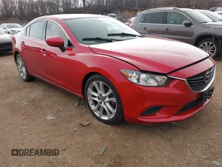 2015 Mazda 6 i Touring with VIN JM1GJ1V54F1190894, listed as a IAAI auction lot 41807751 with 163,342 mi miles and . Bid and sale history available at DreamBid. Image 1.