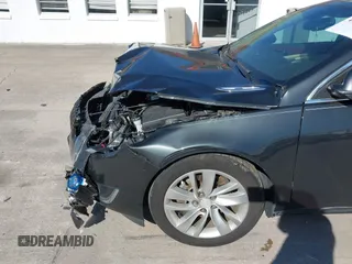 2014 Buick Regal with VIN 2G4GK5EX1E9261240, listed as a IAAI auction lot 41832937 with 118,211 mi miles. Bid and sale history available at carsss.com. Image 6.
