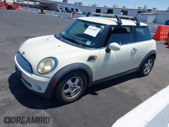 2010 MINI Hardtop with VIN WMWMF3C53ATZ25765, listed as a IAAI auction lot 42314587 with 107,677 mi miles and . Bid and sale history available at DreamBid. Image 2.