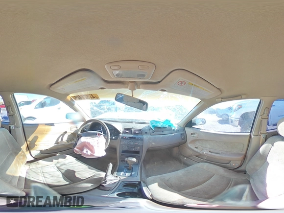 1998 Nissan Maxima GXE with VIN JN1CA21D0WM903051, listed as a Copart auction lot 47821445 with 156,748 mi miles and Salvage title. Bid and sale history available at DreamBid. Image 12.