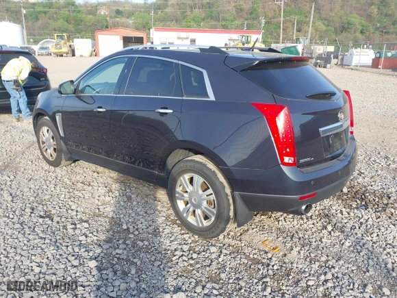 2014 Cadillac SRX Luxury Collection with VIN 3GYFNEE32ES610813, listed as a IAAI auction lot 42098401 with 112,000 mi miles. Bid and sale history available at carsss.com. Image 3.