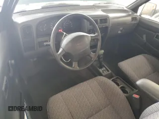 1997 Nissan Frontier XE with VIN 1N6SD16SXVC346717, listed as a Copart auction lot 55442215 with 112,343 mi miles and Salvage title. Bid and sale history available at DreamBid. Image 8.