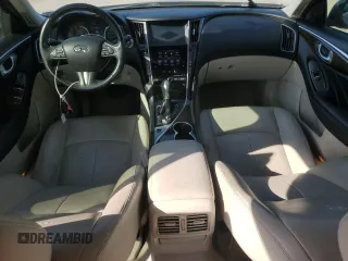 2014 Infiniti Q50 z VIN JN1BV7AR5EM704360, wystawiony jako Copart lot #54883795 z przebiegiem 156 301 mil mil oraz Szkoda całkowita • Salvage title. Historia ofert i sprzedaży dostępna na DreamBid. Obrazek 8.