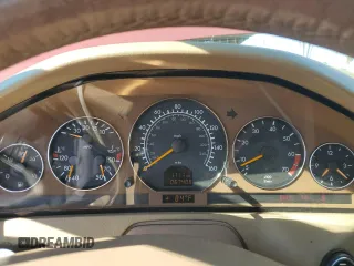 1999 Mercedes-Benz SL-Class with VIN WDBFA68F3XF184908, listed as a Copart auction lot 77165784 with 67,408 mi miles and Salvage Title. Bid and sale history available at carsss.com. Image 9.