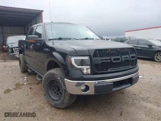 2013 Ford F-150 XL with VIN 1FTFW1CF1DKE10136, listed as a IAAI auction lot 41542711 with 157,549 mi miles. Bid and sale history available at carsss.com. Image 1.