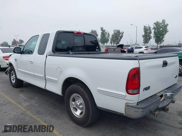 2000 Ford F-150 XL with VIN 1FTRX17L4YNA39407, listed as a IAAI auction lot 42141350 with 82,824 mi miles and . Bid and sale history available at DreamBid. Image 3.