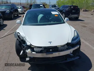 2018 Tesla Model 3 Long Range Battery with VIN 5YJ3E1EA3JF057527, listed as a IAAI auction lot 42072126 with 1 mi miles. Bid and sale history available at carsss.com. Image 11.