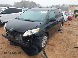 2012 Toyota Sienna XLE with VIN 5TDDK3DC3CS030466, listed as a IAAI auction lot 41914368 with 174,512 mi miles. Bid and sale history available at carsss.com. Image 2.