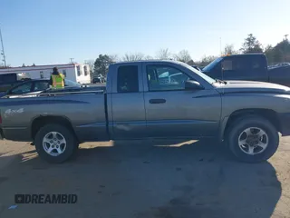 2005 Dodge Dakota SLT with VIN 1D7HW42N75S220495, listed as a IAAI auction lot 41825320 with 123,085 mi miles and . Bid and sale history available at DreamBid. Image 13.
