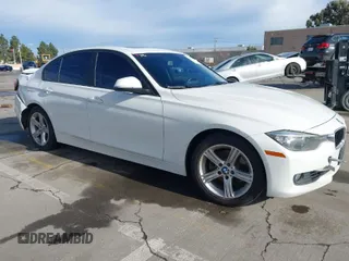 2015 BMW 3 Series 328i with VIN WBA3C1C52FK119339, listed as a IAAI auction lot 41549876 with 148,347 mi miles and . Bid and sale history available at carsss.com. Image 1.
