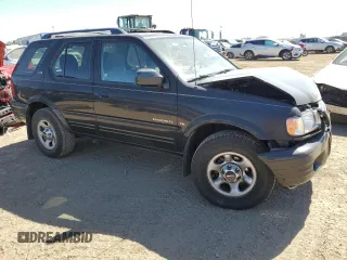 2001 Isuzu Rodeo S with VIN 4S2DM58W914354772, listed as a Copart auction lot 72208564 with 146,507 mi miles and Salvage Title. Bid and sale history available at carsss.com. Image 4.