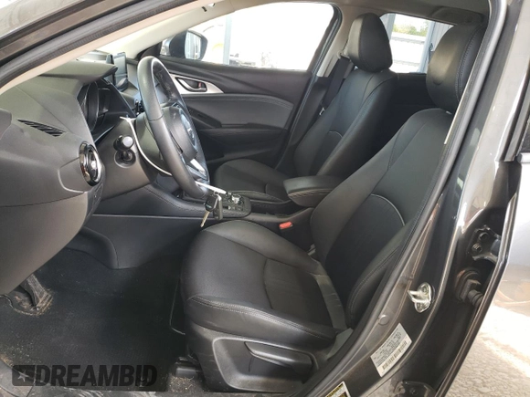 2019 Mazda CX-3 Touring z VIN JM1DKFC75K1439294, wystawiony jako Copart lot #52967955 z przebiegiem 16 966 mil mil oraz Czysty tytuł • Clean title. Historia ofert i sprzedaży dostępna na DreamBid. Obrazek 7.