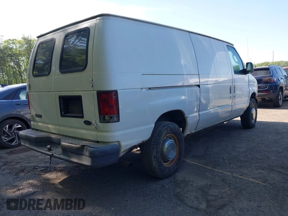 2004 Ford Econoline Cargo Commercial with VIN 1FTNE24W04HA50342, listed as a IAAI auction lot 42145274 with 158,408 mi miles and . Bid and sale history available at carsss.com. Image 4.