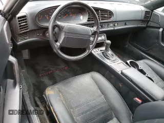 1990 Porsche 944 z VIN WP0CB2946LN480366, wystawiony jako Copart lot #74369454 z przebiegiem 78 709 mil mil oraz Szkoda całkowita • Salvage title. Historia ofert i sprzedaży dostępna na DreamBid. Obrazek 8.