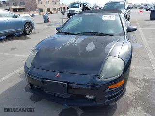 2001 Mitsubishi Eclipse GT with VIN 4A3AE85H61E129879, listed as a IAAI auction lot 41619874 with 132,493 mi miles. Bid and sale history available at carsss.com. Image 6.