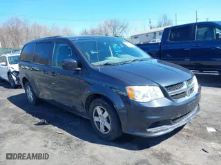 2013 Dodge Grand Caravan SXT with VIN 2C4RDGCG3DR624092, listed as a IAAI auction lot 41860395 with 164,539 mi miles. Bid and sale history available at carsss.com. Image 1.