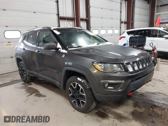 2019 Jeep Compass Trailhawk with VIN 3C4NJDDB2KT649889, listed as a IAAI auction lot 41562599 with 70,700 mi miles and . Bid and sale history available at carsss.com. Image 1.