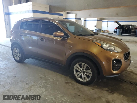 2017 Kia Sportage LX with VIN KNDPMCAC9H7157171, listed as a Copart auction lot 54885905 with 194,496 mi miles and Salvage Title. Bid and sale history available at DreamBid. Image 4.
