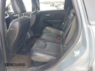 2015 Jeep Cherokee Trailhawk with VIN 1C4PJMBS0FW524479, listed as a IAAI auction lot 41908871 with 118,825 mi miles and . Bid and sale history available at DreamBid. Image 8.