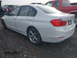 2015 BMW 3 Series 328i xDrive with VIN WBA3B5G59FNS19005, listed as a IAAI auction lot 41570070 with 104,666 mi miles. Bid and sale history available at carsss.com. Image 3.