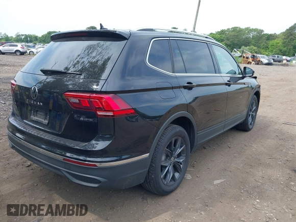 2024 Volkswagen Tiguan SE with VIN 3VVMB7AX6RM079301, listed as a IAAI auction lot 42404572 with 8,573 mi miles and . Bid and sale history available at DreamBid. Image 4.