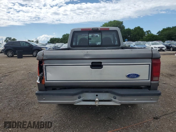 1991 Ford Ranger STX with VIN 1FTCR14X7MPA03412, listed as a Copart auction lot 63078515 with 32,891 mi miles and Salvage title. Bid and sale history available at DreamBid. Image 6.