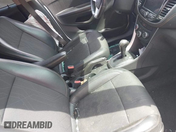 2022 Chevrolet Trax LT with VIN KL7CJPSM4NB530127, listed as a IAAI auction lot 42103923 with 34,851 mi miles and . Bid and sale history available at DreamBid. Image 5.