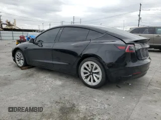 2022 Tesla Model 3 with VIN 5YJ3E1EA3NF190102, listed as a Copart auction lot 50657535 with 73,015 mi miles and Salvage Title. Bid and sale history available at DreamBid. Image 2.