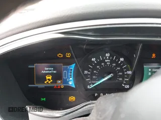 2015 Ford Fusion S Hybrid with VIN 3FA6P0UU7FR167229, listed as a IAAI auction lot 41684934 with 135,317 mi miles. Bid and sale history available at carsss.com. Image 7.