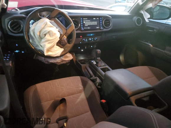 2021 Toyota Tacoma SR5 with VIN 3TYBZ5DN6MT000982, listed as a Copart auction lot 88558335 with 28,991 mi miles and Salvage title. Bid and sale history available at DreamBid. Image 8.