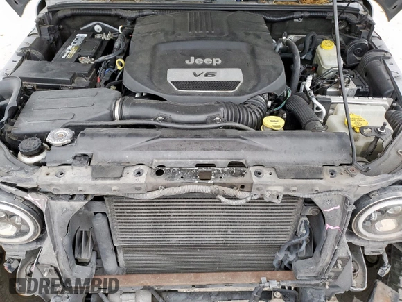 2014 Jeep Wrangler Unlimited Rubicon с VIN 1C4HJWFG3EL322449, выставлен на аукционе Copart как лот 57187665 с пробегом 122 469 миль миль и Списание • Salvage title. История ставок и продаж доступна на DreamBid. Изображение 11.