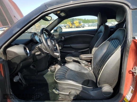 2013 MINI Coupe S with VIN WMWSX3C58DT466788, listed as a Copart auction lot 75541314 with 101,890 mi miles and Salvage Title. Bid and sale history available at DreamBid. Image 7.