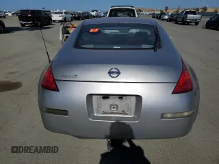 2004 Nissan 350Z Touring z VIN JN1AZ34E94T062960, wystawiony jako Copart lot #55822235 z przebiegiem 186 879 mil mil oraz Szkoda całkowita • Salvage title. Historia ofert i sprzedaży dostępna na DreamBid. Obrazek 6.